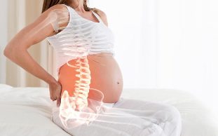 dolore alla schiena durante la gravidanza causa
